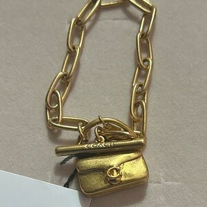 Coach Gold Chain Bracelet with a Tabby Bag Charm Bag Charm NWT & Dusty